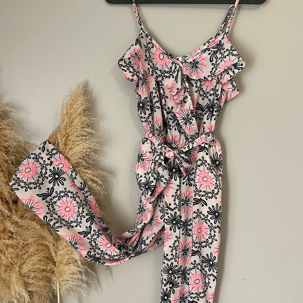 Black and Pink floral romper size small. Thin material perfect for summer.